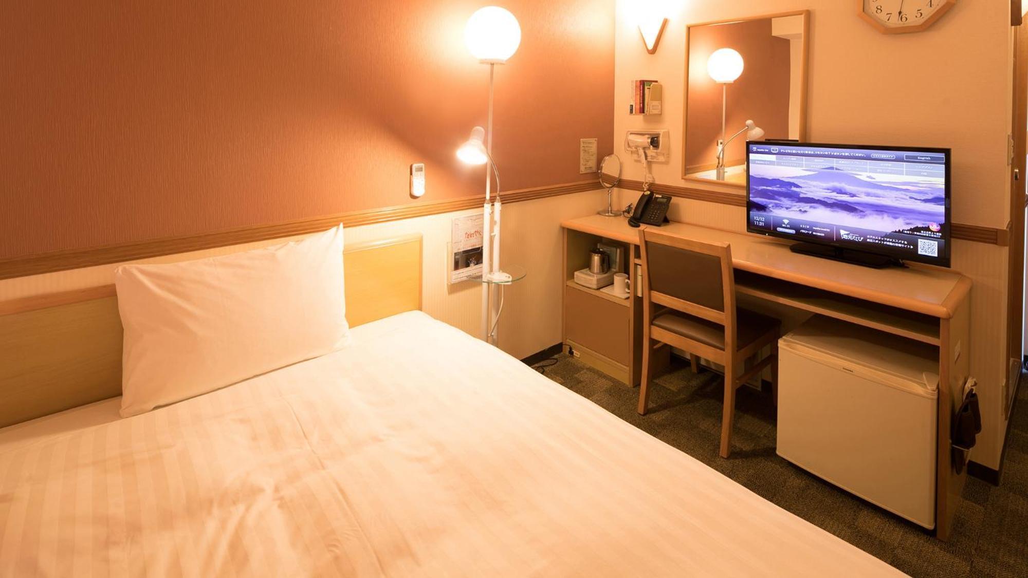 Toyoko Inn Matsuyama Ichibancho Номер фото